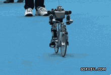 超帅的微型机器人会骑单车(点击浏览下一张趣图)