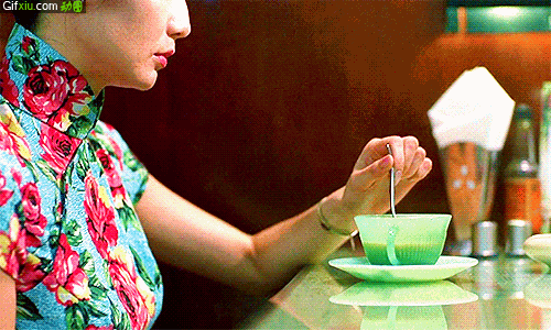 旗袍美女喝茶的图片(点击浏览下一张趣图)