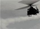 武装直升机发射炮弹动态图片
